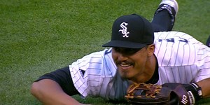 Tyler Saladino went slipping and sliding before making the throw from his stomach