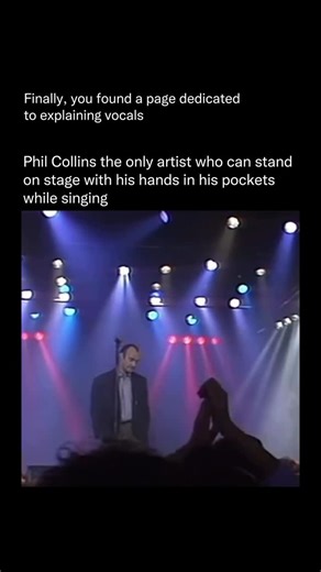 Explaining Vocals on Instagram: "Phil Collins never needed theatrics to command a stage — his voice, presence, and emotional control were always enough. In this live performance of Another Day in Paradise, he stands almost motionless, hands in his pockets, letting the weight of the lyrics do the heavy lifting. Every line lands with quiet force, turning stillness into power. The song’s message — about isolation, hardship, and overlooked humanity — hangs in the air as the audience listens in near 