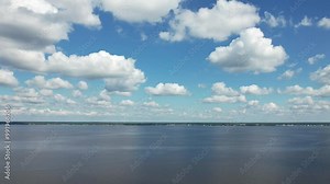 Aerial hyper lapse of clouds over the Bogue Sound in North Carolina, drone time lapse.