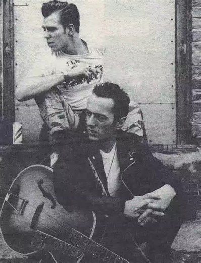 In 1976, The Clash emerged from London as one of the most influential bands of the British punk movement, combining raw energy with socially conscious lyrics that reflected the turbulent political climate of the time. Founding members Joe Strummer, Mick Jones, and Paul Simonon, along with drummer Topper Headon, quickly distinguished themselves through electrifying live performances and a distinctive blend of punk, reggae, and rockabilly influences. Their early rehearsals and performances in smal