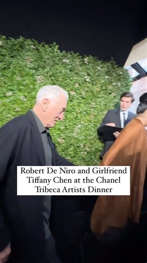 #RobertDeNiro and girlfriend #TiffanyChen make their way through the red carpet at the Chanel Tribeca Artists Dinner. | People