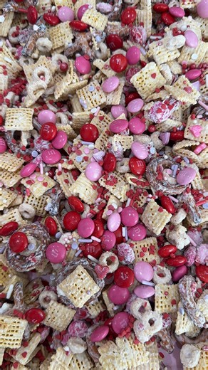 One of my favorite treats EVER and so easy to make 💘 Recipe: - 3 cups Chex mix (you can use rice or corn or both Chex cereal) - 1 cup plain Cheerios - 1 bag of Valentines M&M’s - 1-2 cups of pretzels - Valentines sprinkles - 1 10 ounce bag of white chocolate melting wafers In a big mixing bowl, combine the Chex cereal, Cheerios, pretzels, half bag of M&M’s, and some sprinkles. Melt the white chocolate melting wafers, then pour over the cereal mixture. Mix to combine until evenly coated. Put the