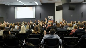 Audience raise hands at business conference - Free Stock Video