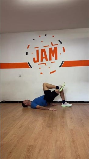 Puente glúteo unilateral con elevación de rodilla