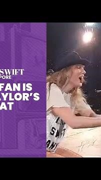 Taylor Swift in Singapore: Young fan is given Taylor's 22 hat