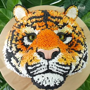 3.2M views · 19K reactions | Happy Tiger Day!  Have you EVER seen a cake as stunning as this? 李 MIND BLOWN, Letterpress Bakery!! Did you know that there are less than 4,000 tigers left in the wild? Get more info on how to join Discovery's Project CAT: projectcat.discovery.com #NationalTigerDay | Food Network | Facebook