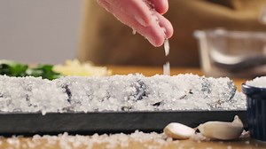Preparing Salt-Crusted Fish | Premium Stock Video Footage