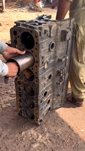 Mechanic Skills Ffc on Instagram: "Hard Work: Removing Stuck Cylinder Liners from Truck Engine Removing cylinder liners from a heavy-duty engine is no easy task! 🚛⚙️ In this video at Pro Mechanic Work, we show you the raw power and technique used to extract worn-out sleeves from a massive diesel engine block. This is the essential first step before we can install new liners and rebuild the engine to its former glory. 🛠️💪" #ProMechanicWork #LinerRemoval #EngineTeardown #TruckRepair #HeavyDutyE