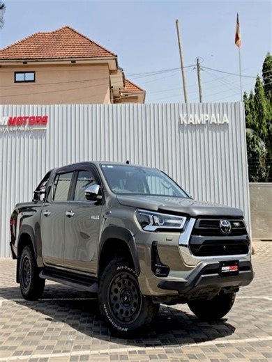 Khushi Motors | Uganda Premium Car Dealership on Instagram: "Toyota Hilux 4WD * YOM: 2021 * Ext: Rugged Brownish Green exterior * Int: Black leather interior * Engine Size: 2.4L Turbo Diesel * Transmission: Automatic * Drive: 4WD Toyota Hilux (D25-493) Price Starts From 185M UGX 🌐 www.khushimotors.com/uganda 📞 Shahbaz: +256 708 305555 📞 Zeeshan: +256 708 325555 📍 Khushi Motors Uganda, Ntinda Road, Kampala #ToyotaHilux #Hilux4WD #DieselPickup #OffRoadTruck #khushimotorsuganda"