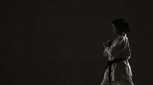 Karate Girl Practicing Jump Kick Wearing Stock Footage Video (100% Royalty-free) 1020040048 | Shutterstock