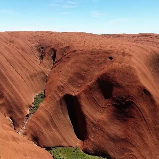 ULURU - a sacred mountain, towering in the center of the Australian continent