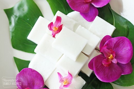 Haupia is a widely popular Hawaiian dessert that is smooth, creamy, and gelatin-like in texture. It’s like little refreshing bites of Hawaii. https://www.favfamilyrecipes.com/haupia/ | Favorite Family Recipes