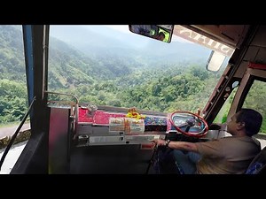 A Day in Life of Skilled Bus Driver Riding Through Dangerous Mountain Roads