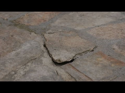 Laying stone slabs on the floor - Bricomanía