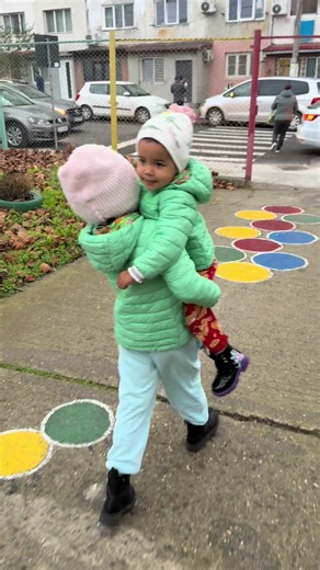 Big sister carrying her little sister, the sweetest kind of strength. 💛 Their bond grows stronger with every step. #BigSisterLove #SistersBond #FamilyMoments #Sisterhood #MomLife