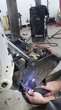 Easiest way to get bushings out of a Bobcat without special tools
