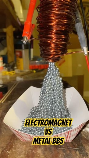 Powerful Electromagnet vs. Metal BBs #experiment #engineering #physics #satisfying #magnetic