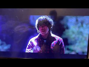 Woman handcuffed behind to pole