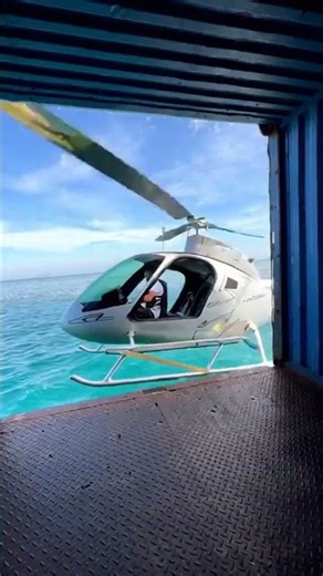I found a helicopter inside a shipping container at sea and flew away (simulation)