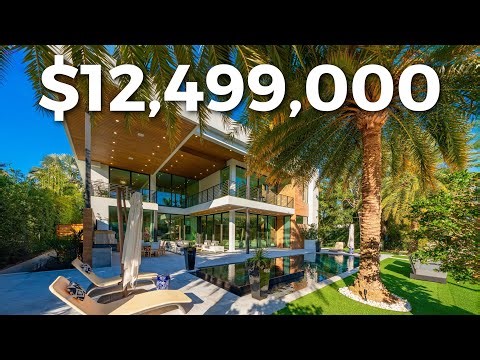Inside this $12,499,000 Luxury Florida Waterfront Mansion with VIRTUAL GOLF!
