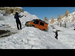 Ford transit 4x4 Adventure camper playing in snow.
