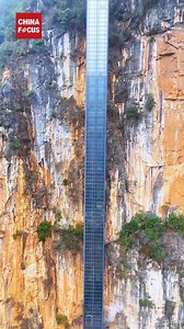 A 268-meter cliffside elevator and a cable car in the canyon have now become the "air school bus" for the children of Nizhuhe village in Yunnan province, making the once arduous journey to school convenient and enjoyable. It is a path of unconventional modernization. To drive development, local authorities introduced tourism projects, leading to the construction of the cliffside elevator and cableway as supporting infrastructure. Villagers and students can ride for free with priority access. | C