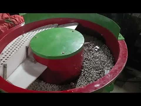 Vibratory finishing machines for deburring and finishing of aluminium exruded parts