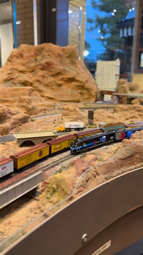 Amtrak passes a reefer train pulled by a Union Pacific Big Blow locomotive. #reefer #hobby #trains #railroad #amtrak | Garret Hauser