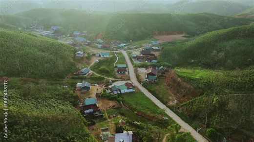 Breathtaking Aerial View of Coffee Plantations in Lac Duong Mountains, Vietnam The footage reveals vast Arabica coffee farms nestled deep within the misty Central Highlands.