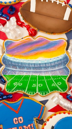 TBH I wasn't feeling very inspired to make football cookies, but then I had the idea to add a sunset and now I love this design! I hope this sparks a new cookie idea for you 😊 #icingcookies #footballcookies #royalicingcookies #decoratedcookies #superbowlpartyideas | SweetAmbs