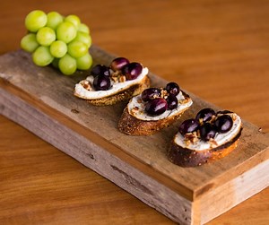 1.9K views | Grapes and cheese pair perfectly in a multitude of recipes, including this Roasted Grape, Rosemary Goat Cheese, and Pecan Toast recipe by Marisa Moore Nutrition. Go with grapes from California for a small bite of amazing flavor! Get the recipe at https://bit.ly/2Uy8ql0. | Grapes From California | Facebook