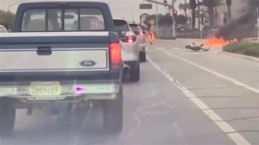 Dirt bike EXPLODES in fireball leaving rider on fire but miraculously survives