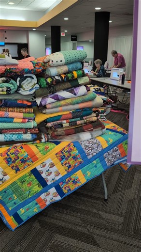 Share your love of quilting by joining our community service project, Quilt to Give, led on site by Nancy Zieman Productions, LLC, from 9 a.m. - 3 p.m. in the atrium. You can help create a warm welcome for refugee families resettling in Wisconsin. Your quilt will be gifted to new neighbors alongside PBS KIDS educational materials for children and distributed to families in their new communities throughout the year by PBS Wisconsin Education. | The Great Wisconsin Quilt Show