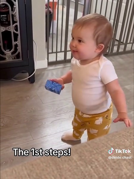Baby Takes First Steps: A Heartwarming Moment