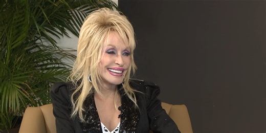 Dolly Parton celebrates the latest expansions of her Imagination Library reading program
