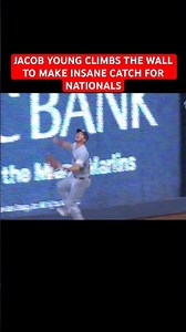 JACOB YOUNG CLIMBS THE WALL TO MAKE INSANE CATCH FOR NATIONALS