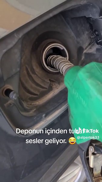 Refueling a Car at a Modern Gas Station