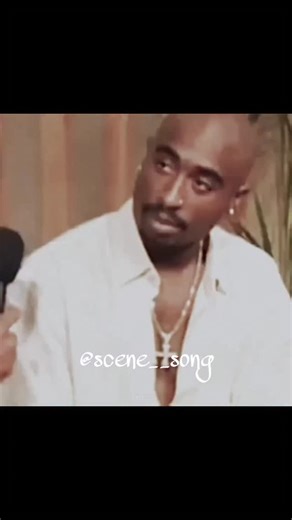 Scene Song on Instagram: "​The Concept: The video uses AI voice cloning to make it sound like an interviewer is asking Tupac about the state of rap in 2025. Tupac’s "reaction"—the legendary laugh—is a clever edit used to imply that he wouldn't take today's rap scene very seriously. ​The Music: The background track is a slowed-down version of "Ms. Jackson" by Outkast. Even though it’s not a Tupac song, it fits the "Old School" aesthetic perfectly. ​Visual Style: This is a classic "Fan Edit" featu