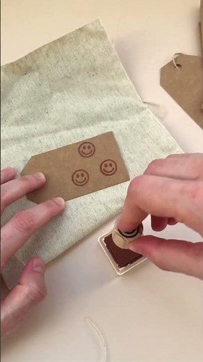DIY gift tags with mini smiley stamp and paper ink pad #stamps #gifttags #wrappingideas