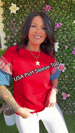 Cute patriotic tee with red stripes and blue stars, soft stretchy cotton, and the prettiest puff sleeves. Lightweight, breathable, and perfect for the 4th or everyday wear. #tiktokshopmothersday #casual #affordablefashion #womensclothing #tiktokshopcreatorpicks #outfitideas @Hannah Marie #rufflesleeveblouse #tshirttops #womenselegantsummertop #styletops #shortsleevetops #4thofjuly #4thofjulyoutfit #musthave #usa #america #cutetops #womensfashion #puffsleeve #casualoutfits #memorialday #patriotic