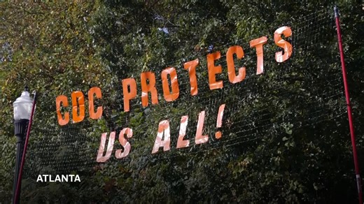 Retired CDC employees protest outside meeting of Health Secretary's vaccine advisers