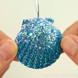 102K views · 1K reactions | SEASHELL ORNAMENTS - So pretty! Instructions >> https://onelittleproject.com/seashell-ornaments/ | One Little Project | Facebook