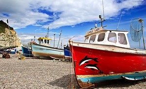 Boats on the beach at Beer, Devon.