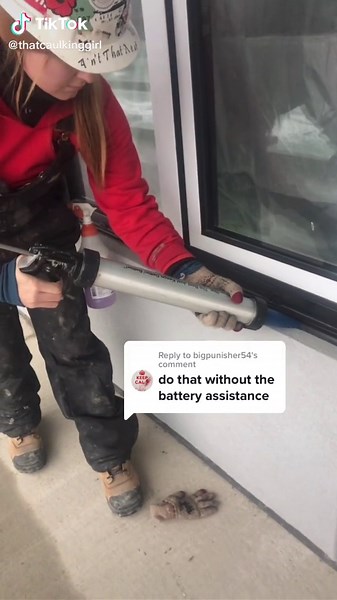 Woman in Construction Demonstrates Caulking with a Manual Gun
