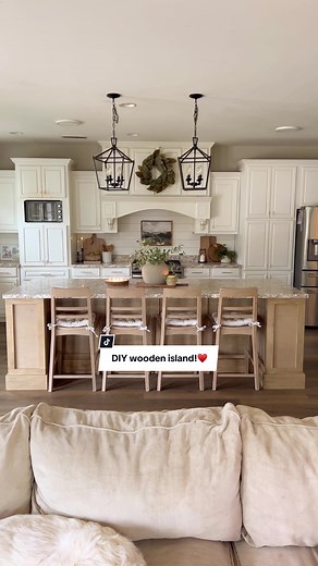 Our kitchen island transformation! We took 3 in stock cabinets/drawers from Home Depot and transformed them into this island! The stock cabinets we used were white, so We had to take the drawer fronts off and sanded the white paint off the fronts!! Then we replaced them with new wooden fronts but that was still way more simple than him building each and every cabinet base and drawers with the glides and all that lol. Then we built Columns for the sides, added some detail work, and stained everyt