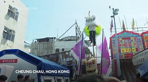 Crowds cram tiny island for Hong Kong's traditional bun festival