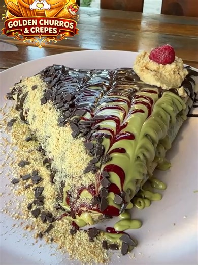 Crepes With Darks Chocolate, Pistachio, Raspberries and Snickers