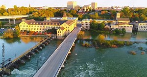 Sunrise flyover of beautiful Appleton Wisconsin riverfront and downtown in Autumn. Stock Video