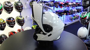 NOW IN STOCK the Shoei Neotec 3 Flip Front Helmet (White) RRP £589.99 Introducing the pinnacle of motorcycle helmet technology, the AIM fibreglass and organic fibre layered shell construction helmet. It's dual homologated for open and closed use, boasts a dual density EPS liner for enhanced impact protection, and features a mist-resistant CNS-3C visor with a center locking system. Enjoy fresh airflow through easy-to-use vents, and stay secure with a stainless steel micro ratchet retention system