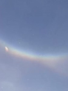 Snowboarder captures the incredible weather phenomenon—the rare 'Sun Dog'—on camera. ☀️⛅ | Astrophile